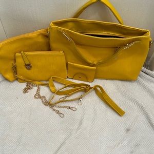 4 piece set yellow purse.